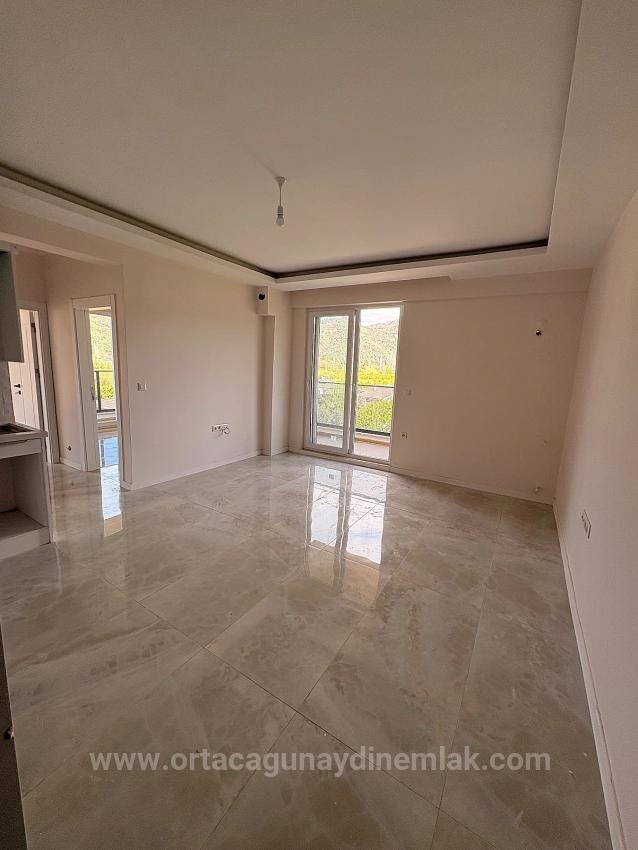 2+1 Wohnung Mit Pool Zum Verkauf Im Stadtteil Ortaca Çaylı.
