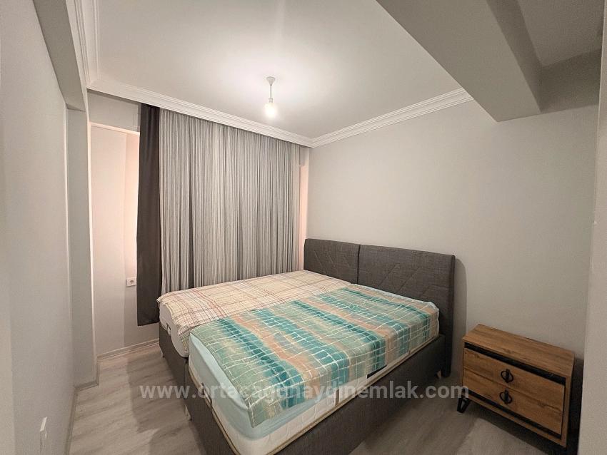 Voll Möbliertes 3+1-Zimmer-Apartment Mit Pool Im Stadtteil Ortaca Karaburun.