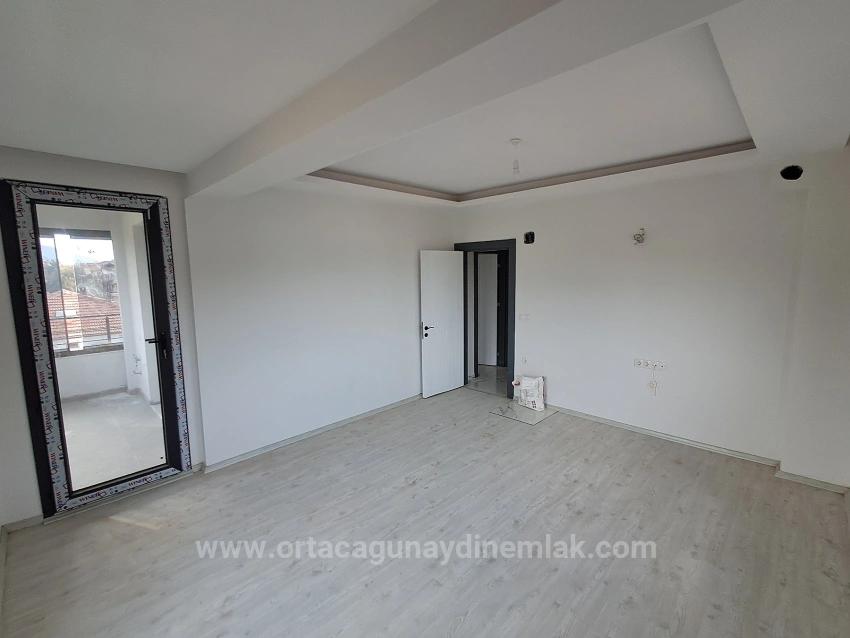 Brandneue 2+1 Wohnung Zum Verkauf In Ortaca Karaburun Mit Geschlossener Küche