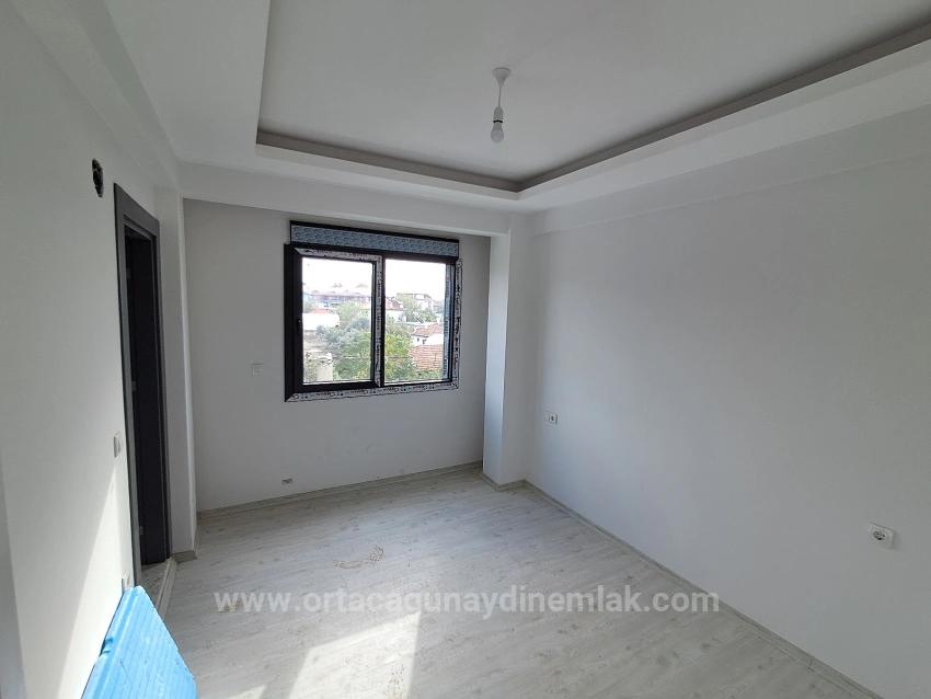 Brandneue 2+1 Wohnung Zum Verkauf In Ortaca Karaburun Mit Geschlossener Küche