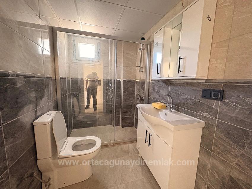 1+1-Apartment Zu Vermieten, 60 M2, Ortaca Karaburun Viertel.