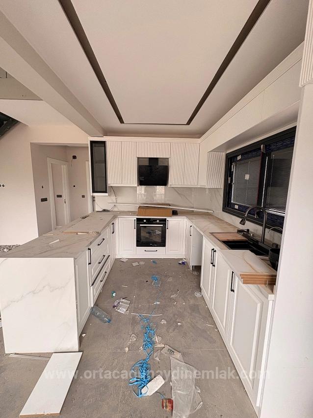 Moderne Luxusvilla Mit 3+1 Bädern Zum Verkauf Im Stadtteil Ortaca Dikmekavak.