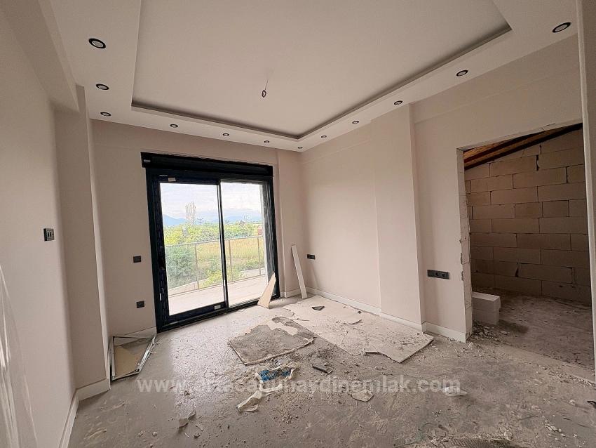 Moderne Luxusvilla Mit 3+1 Bädern Zum Verkauf Im Stadtteil Ortaca Dikmekavak.