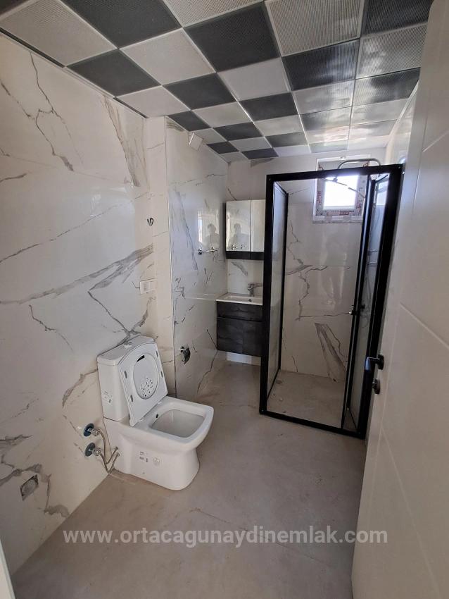 1+1 Neue Wohnung Zum Verkauf In Ortaca Çaylı Mit Pool