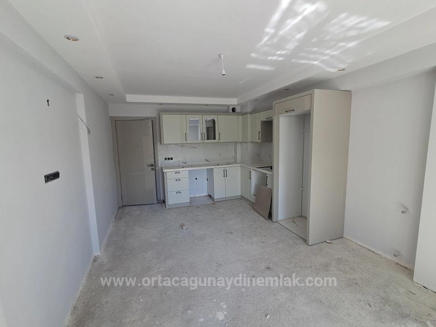 1+1-Apartment Zum Verkauf In Einer Luxusanlage Mit Pool In Ortaca Bahçelievler