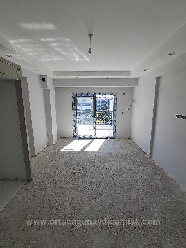 1+1-Apartment Zum Verkauf In Einer Luxusanlage Mit Pool In Ortaca Bahçelievler