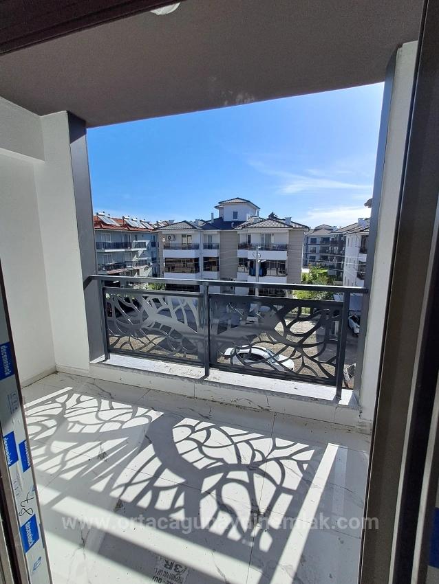 1+1-Apartment Zum Verkauf In Einer Luxusanlage Mit Pool In Ortaca Bahçelievler