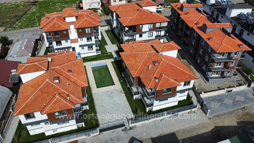 1+1-Apartment Zum Verkauf In Ortaca Karaburun, In Einer Anlage Mit Pool