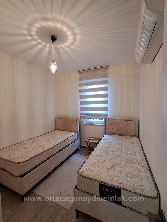 Günaydin Emlaktan Karaburunda Havuzlu Site Eşyali 2+1 Kiralik Daire