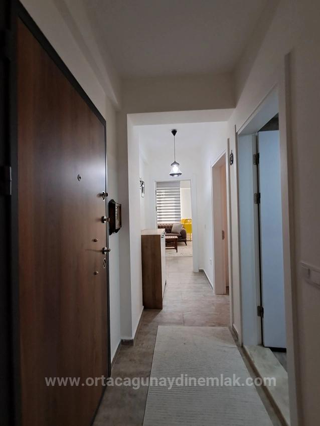 Günaydin Emlaktan Karaburunda Havuzlu Site Eşyali 2+1 Kiralik Daire