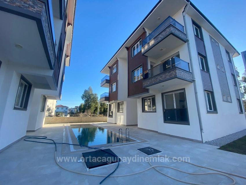 Brandneue 1+1-Wohnung In Einer Anlage Mit Swimmingpool Im Stadtteil Söğütlüyurt Von Dalaman