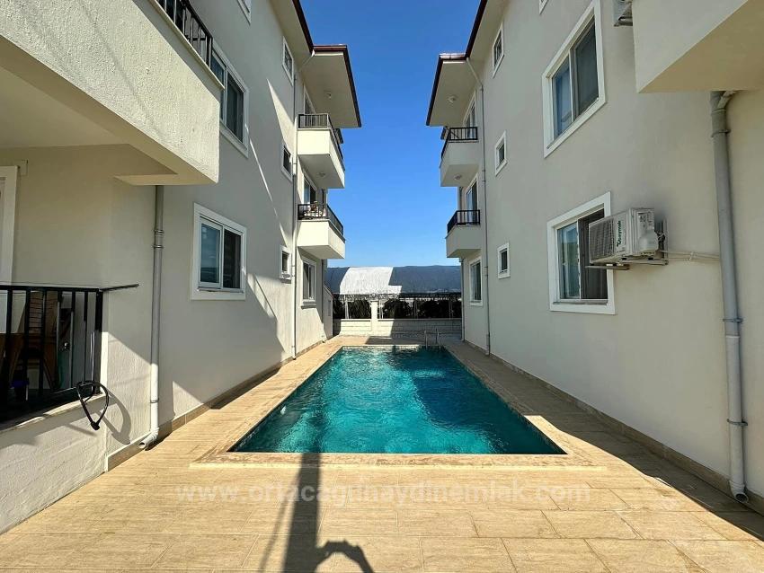 3+1 Wohnung Zum Verkauf Mit Pool In Ortaca Karaburun