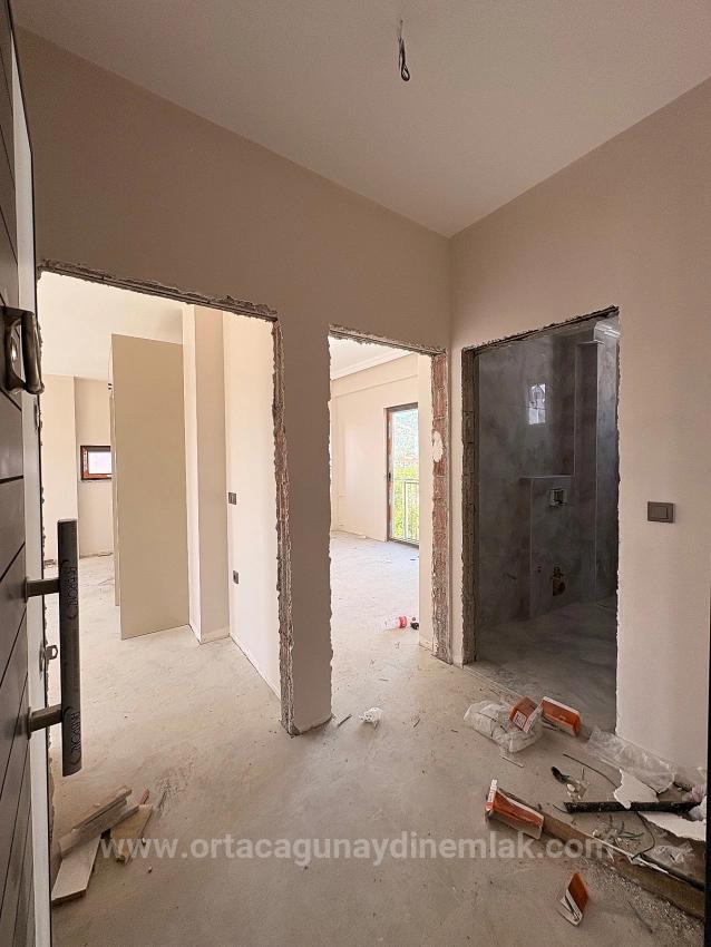1+1-Zimmer-Wohnung Mit Großem Pool Im Stadtteil Karaburun, Ortaca, Muğla Zu Verkaufen