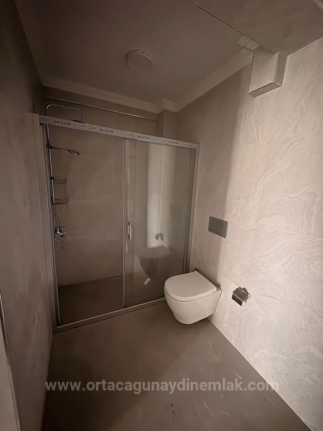 2+1 Brandneue Wohnung Mit Geschlossener Küche Zum Verkauf Im Stadtteil Arıkbaşı, Ortanca, Muğla.