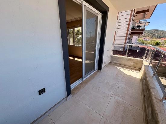 1+1-Apartment Zu Vermieten, 60 M2, Ortaca Karaburun Viertel.