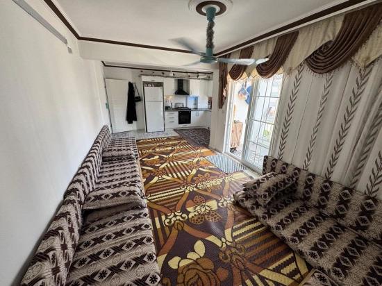 3+1-zimmer-apartment Mit Eigenem Bad Am Boulevard Im Stadtteil Karaburun, Ortaca.
