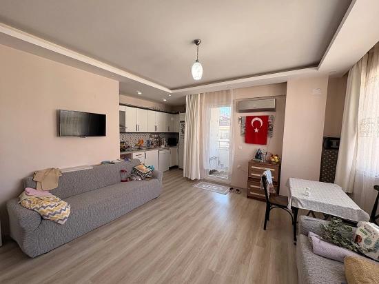 Voll Möblierte 1+1-wohnung Im Stadtteil Ortaca Cumhuriyet Zu Verkaufen.