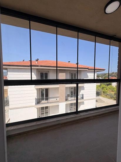 Brandneue 2+1-Zimmer-Wohnung Mit Pool Im Stadtteil Ortaca Çaylı Zu Verkaufen.