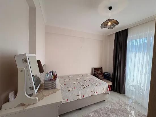 In Ortaca Çaylı mit Pool 2+1 zu verkaufen Wohnung, Eigentumswohnung, Zwischengeschoss