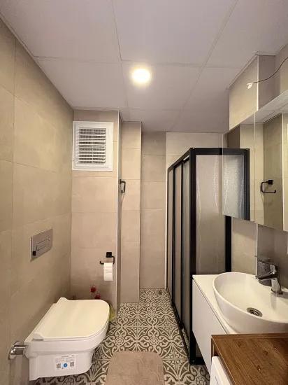 In Ortaca Çaylı mit Pool 2+1 zu verkaufen Wohnung, Eigentumswohnung, Zwischengeschoss