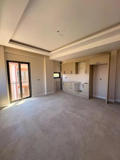 1+1-Zimmer-Wohnung Mit Großem Pool Im Stadtteil Karaburun, Ortaca, Muğla Zu Verkaufen