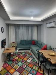 Voll Möbliertes 1+1-Apartment Im Stadtteil Ortaca Karaburun.