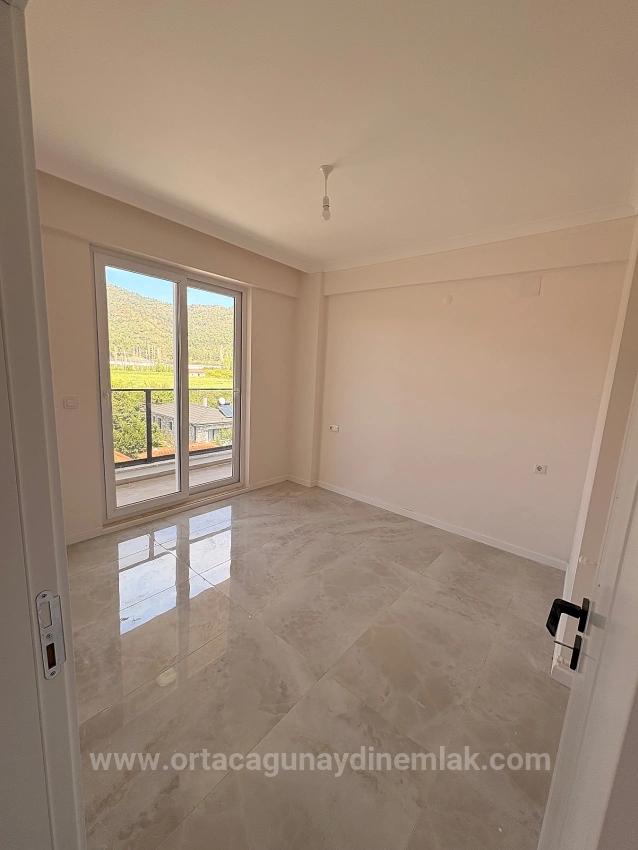 2+1 Apartment With Pool For Sale In Ortaca Çaylı Neighborhood.