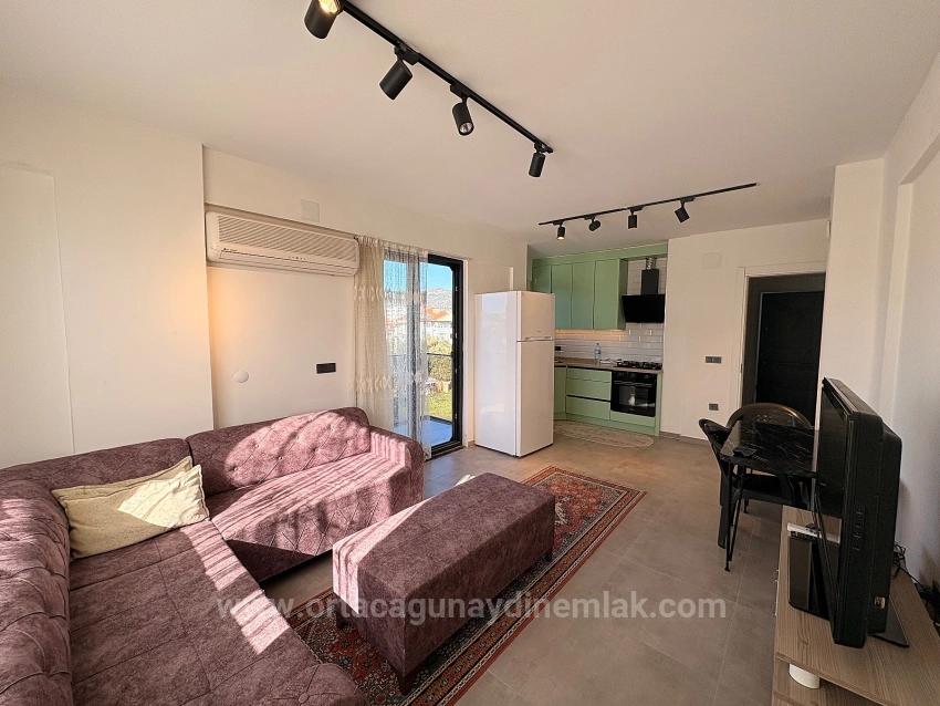 Fully Furnished 1+1 Apartment For Rent In Ortaca Karaburun Neighborhood.