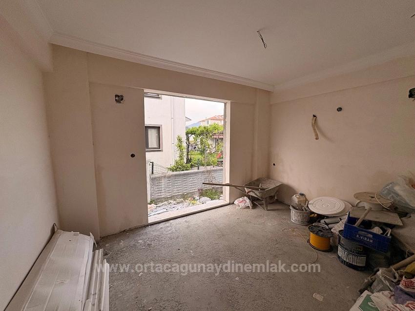 1+1 Apartment For Sale In Ortaca Karaburun Neighborhood.