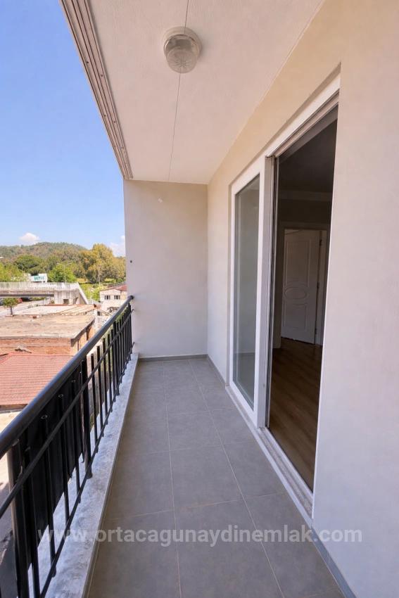 1+1 Apartment For Sale In Dalaman Bezkese Neighborhood, Suitable For Investment