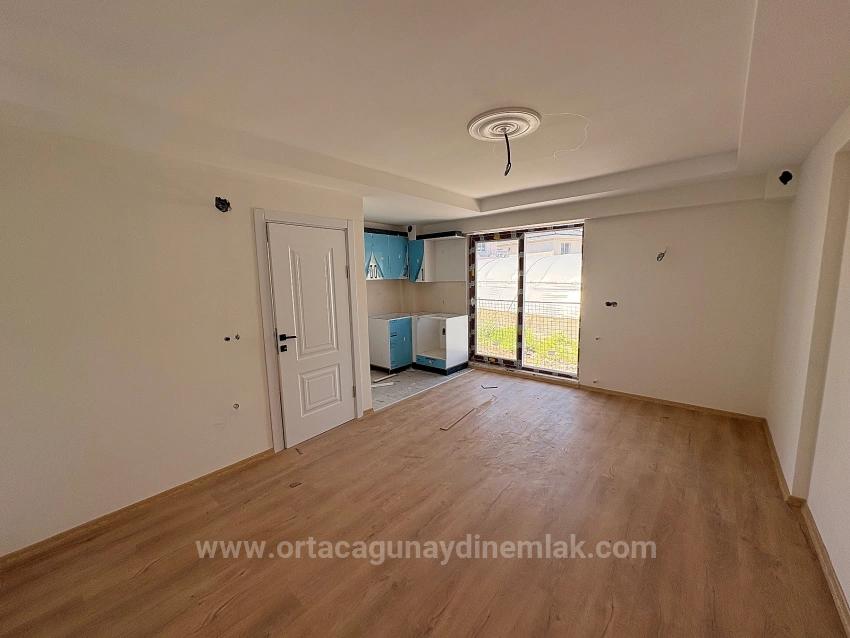 Spacious 1+1 Apartment For Sale In Ortaca Karaburun Neighborhood.