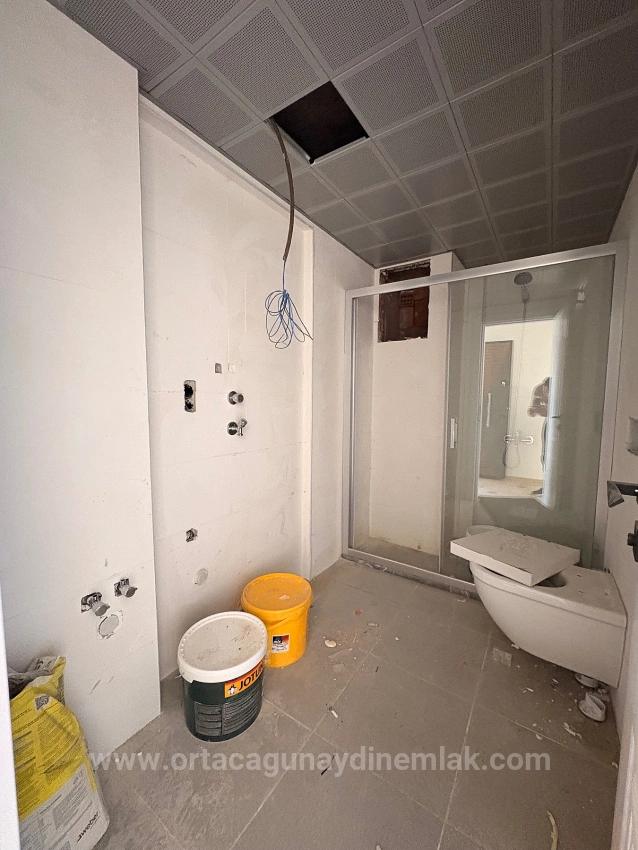 Spacious 1+1 Apartment For Sale In Ortaca Karaburun Neighborhood.