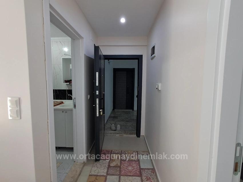 1+1 Furnished Apartment For Sale With Tourism Operation Certificate In Ortaca Karaburun