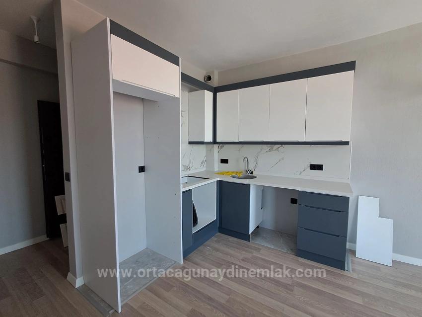 1+1 Apartment For Sale In Ortaca Karaburun, In A Complex With A Pool