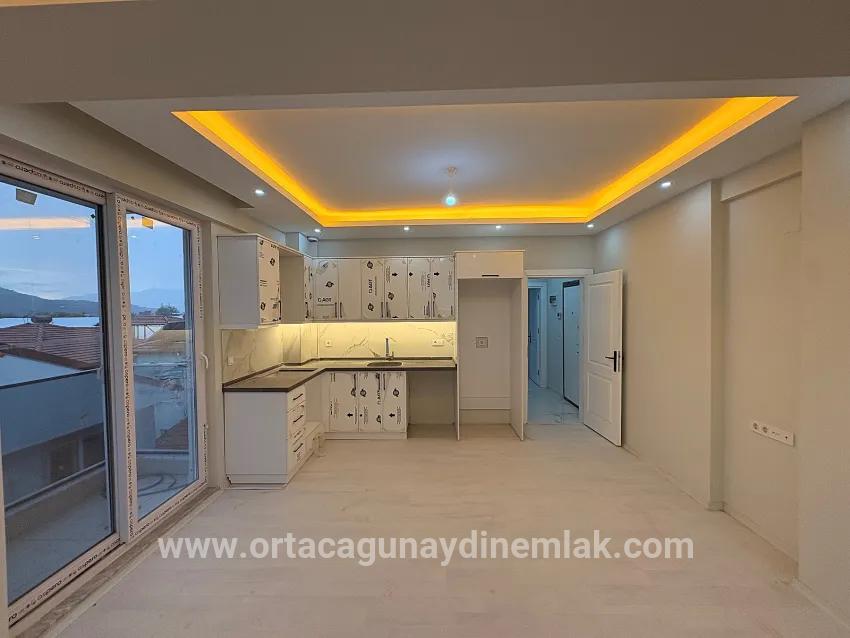 1+1 Bedroom Apartment For sale in Cumhuriyet Nbh. Ortaca - 45 m²