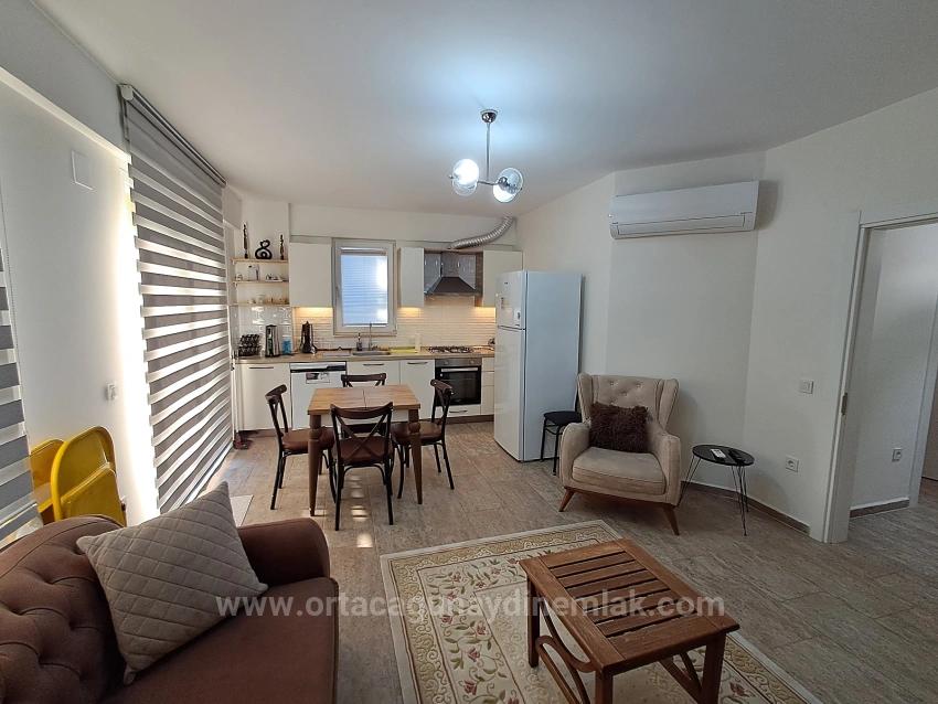 Günaydin Emlaktan Karaburunda Havuzlu Site Eşyali 2+1 Kiralik Daire