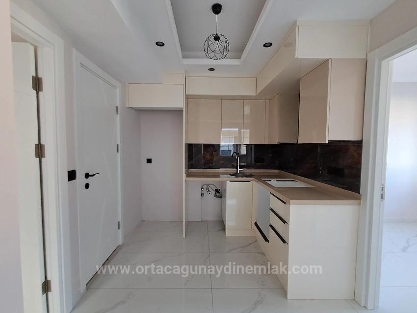 A 2+1 Apartment With Private Entrance And Pool Is For Sale In Cumhuriyet, From Günaydın Real Estate.