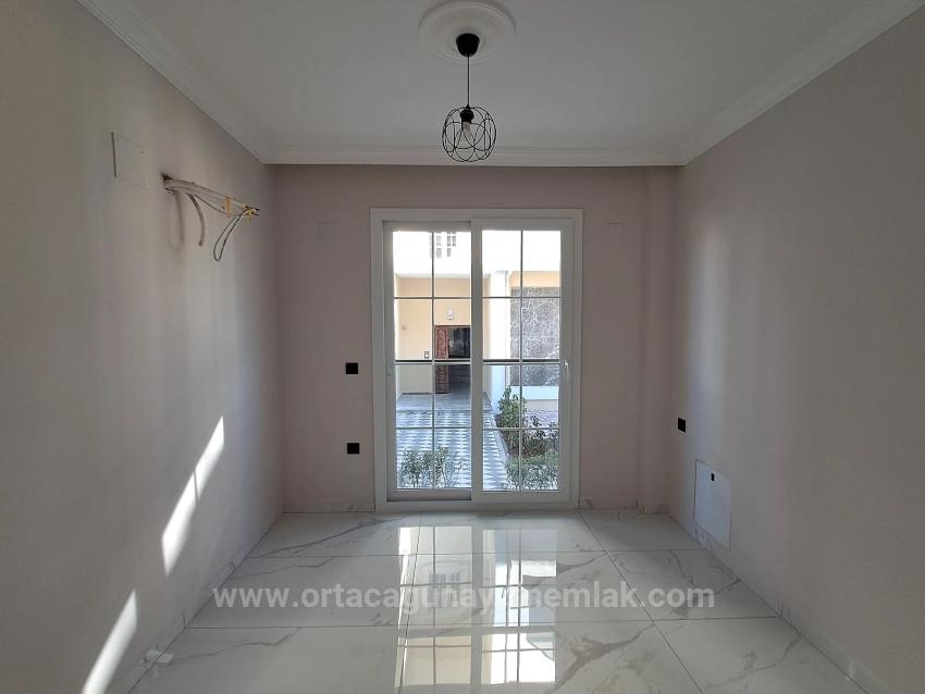 A 2+1 Apartment With Private Entrance And Pool Is For Sale In Cumhuriyet, From Günaydın Real Estate.