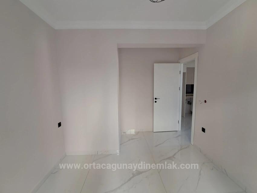 A 2+1 Apartment With Private Entrance And Pool Is For Sale In Cumhuriyet, From Günaydın Real Estate.