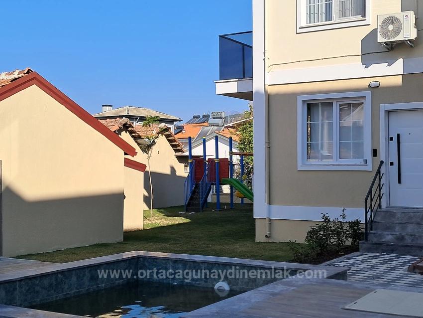 A 2+1 Apartment With Private Entrance And Pool Is For Sale In Cumhuriyet, From Günaydın Real Estate.
