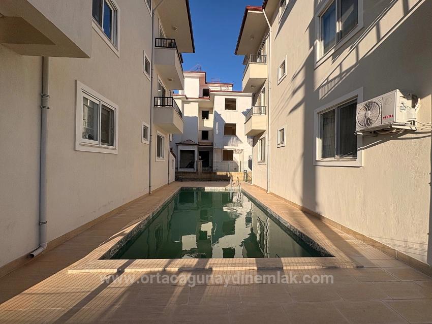 Brand New Furnished 3+1 Apartment With Pool For Sale In Karaburun Neighborhood, Ortaca, Muğla
