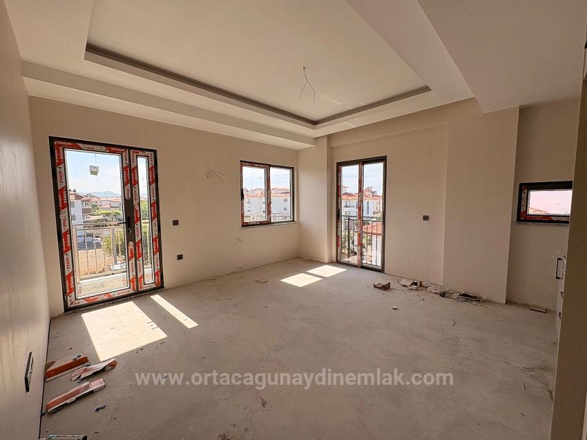 1+1 Apartment For Sale With Large Pool In Karaburun Neighborhood, Ortaca, Muğla