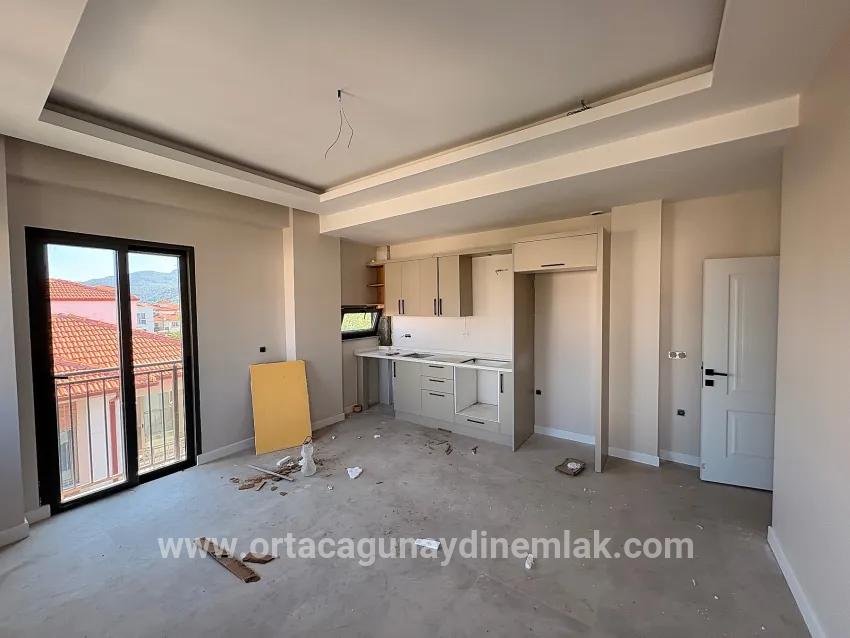 1+1 Bedroom Apartment For Sale in Karaburun Nbh. Ortaca - 60 m²