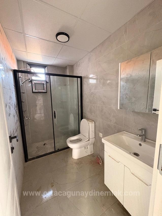 2+1 Apartment With Closed Kitchen For Sale In Ortaca Karaburun Neighborhood.