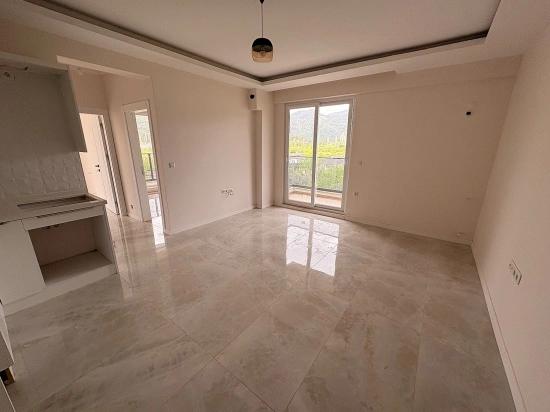 2+1 Apartment With Pool For Sale In Ortaca Çaylı Neighborhood.