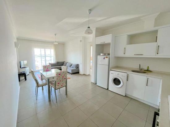 Furnished 2+1 Spacious Flat For Sale In Ortaca Karaburun