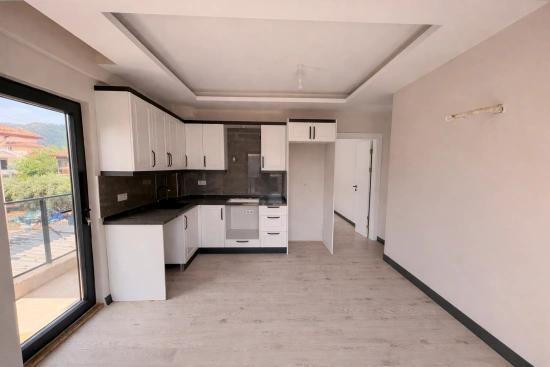 2+1 Mid-Floor Apartment For Rent In Ortaca Karaburun Neighborhood.