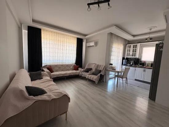 Spacious 2+1 Apartment For Sale In Ortaca Karaburun Neighborhood.