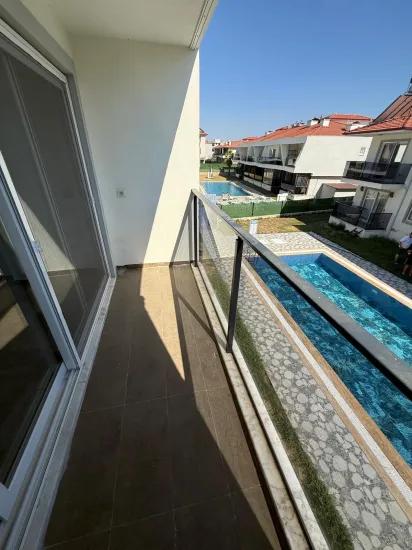 Ortaca Karaburun In a Pool-side Complex 2+1 Apartment for Rent