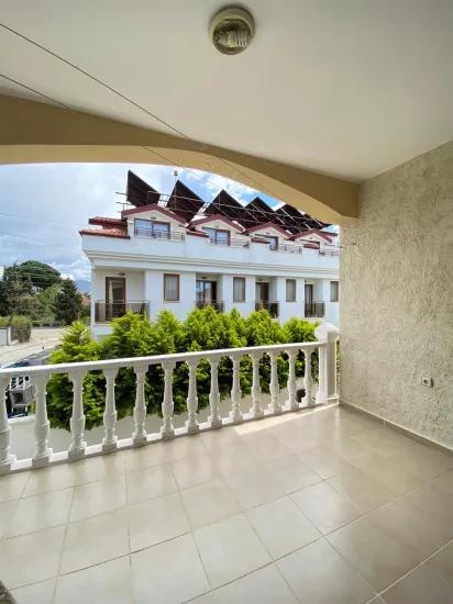 Fethiye In Foça with pool 2+1 apartment for sale, title deed, spacious airy apartment